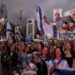 People applauding and cheering in Tel Aviv’s ‘Hostage Square’ as news breaks that the first seven captives are on their way back to Israel.