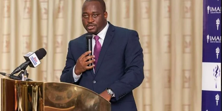 Dr. Theo Acheampong, Economist and Political Risk Analyst