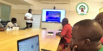 The Ghana Health Information Management System (GHIMS) officials engaging the staff of Tamale Teaching Hospital