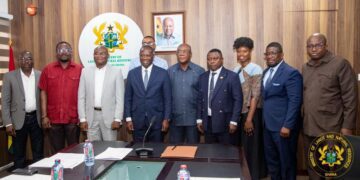 Committee Members with the Lands Minister