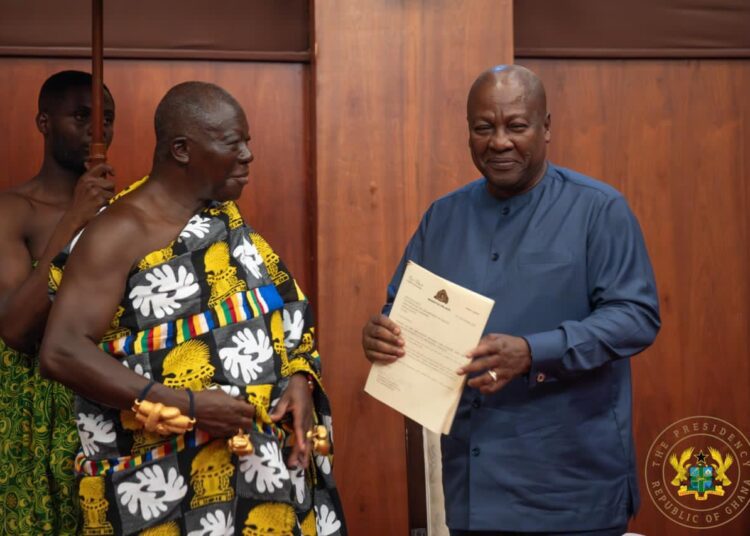Mahama Pledges Lasting Peace for Bawku after Receiving Mediation Report 1 Asantehene Otumfuo Osei Tutu II (L) handing over the Mediation Report to President John Dramani Mahama (R)