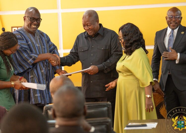 Hold Presidential Election in Nov., Determine Election Petition within 30-Days - CRC 1 President John Dramani Mahama receiving a summary of the CRC's report from its Chairman Professor H. Kwasi Prempeh