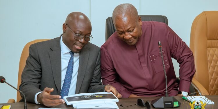 President John Dramani Mahama (R) and Finance Minister Dr Cassiel Ato Forson (L)