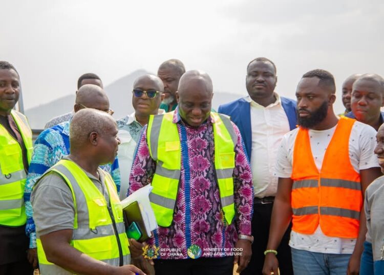 Hon. Eric Opoku, Minister of Food and Agriculture at the Kpong Irrigation Scheme