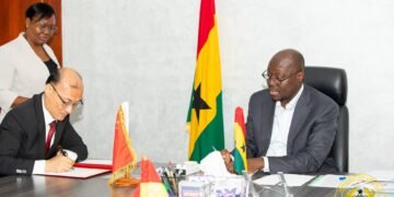 Ghana's Minister for Finance Dr Cassiel Ato Forso and Chinese Ambassador to Ghana, H E Tong Defa