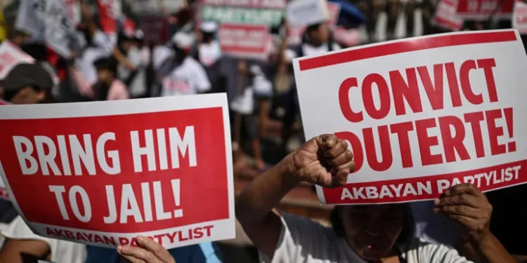 ICC Confirms Crimes Against Humanity Charges Against Duterte 1 2026 02 23T051801Z 2082914773 RC2DRJAOXEJH RTRMADP 3 WARCRIMES DUTERTE PHILIPPINES 1771824584