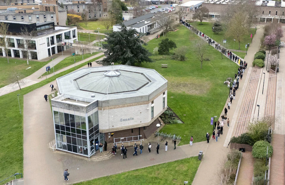 A queue for antibiotics around the University Campus 1