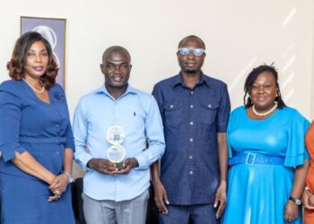 Dr. Patience Agbleze Acorlor, GFZA's Director of Corporate Affairs, PR & Aftercare, Presents 20-Year Commemorative Plaque to Sono Industrial Limited
