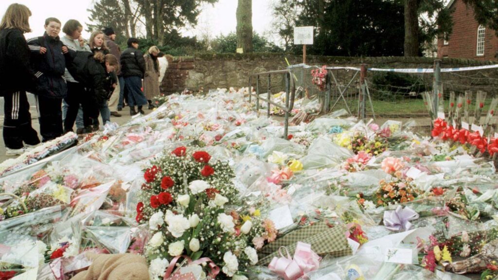 The flowers massed at the gates of Dunblane Primary School following the shooting