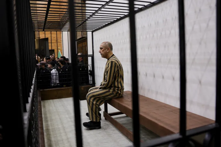 Syria Begins First Public Trial Of Assad-era Officials 2 2026 04 26T083517Z 1105078244 RC2WWKAW30O3 RTRMADP 3 SYRIA POLITICS TRIAL 1777201890 1