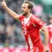 Bayern Edge Real Madrid in Thriller to Book UCL Semi-Final Spot 12 Harry Kane celebrates scoring Bayern's equalizer