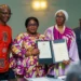 Leaders of Afrobarometer and Rep from Ghana's Ministry of Foreign Affairs at  the signing ceremony