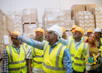Health Minister Kwabena Mintah Akandoh and other officials inspect medical equipment