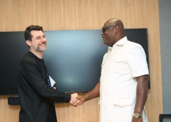 Dr. Adrian Alter, IMF Resident Representative, with Mr. Simon Madjie, GIPC CEO
