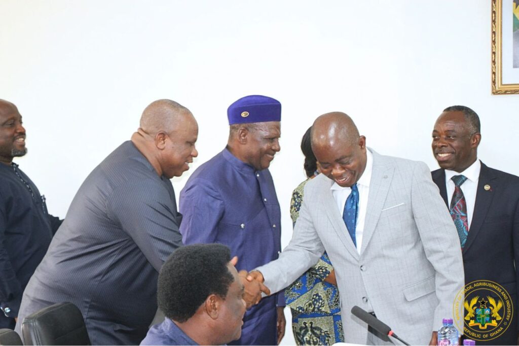 Hon. Sampson Ahi Deputy Minister for Trade Agribusiness and Industry with Dr. Lawrence Kannea Civil Service Council Chairman and Representatives 1
