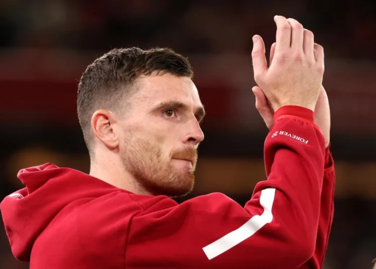 Liverpool Confirm Robertson Exit After Nine Trophy-Laden Years 1 Andy Robertson applauds the fans at Anfield