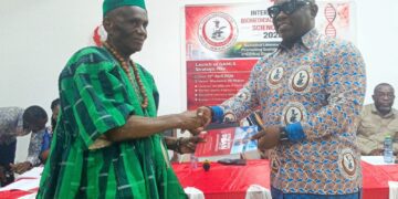 GAMLS President, Dr. Eric Kofi Aidoo with Oti Regional Minister, John Kwadwo Gyapong