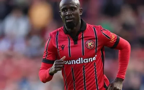 Former Ghana international, Albert Adomah in action for Walsall