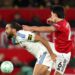 Carrick Slams "Shocking" Martinez Red Card in Leeds Defeat 13 Calvert-Lewin (White) and Lisandro Martinez (red) battle for the ball