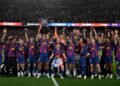 Captain Ronald Araujo lifts the La Liga title in front of the Camp Nou crowd