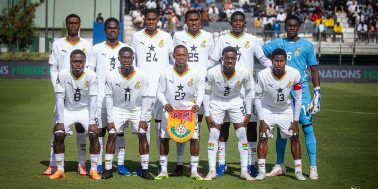 Black Starlets team pose for a pre-match photo