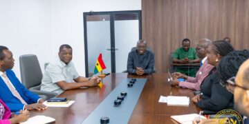 Ghana's Finance Minister Dr Cassiel Ato Forson in discussion with World Health Organization Regional Director for Africa, Dr Mohamed Yakub Janabi