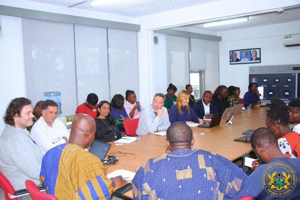 Deputy Minister for Trade Agribusiness and Industry Hon. Sampson Ahi with PSWG Development Partners 1