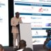 Dr. George Asafo-Agyei, GIPC’s Director of Monitoring and Evaluation, at the Business Forum in Accra