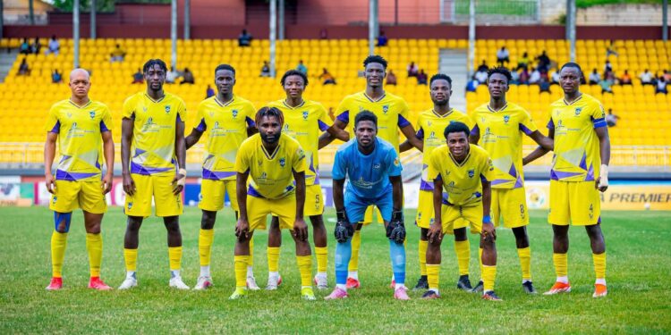 Medeama SC players pose for a pre-match team photo at the TnA Stadium in Tarkwa
