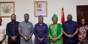 Hon. Emelia Arthur, Minister for Fisheries and Aquaculture Development, with Dr. Riverson Oppong, COMC CEO, and Team