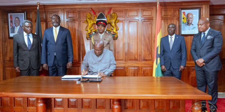 President Mahama signing the arrival book at Nairobi