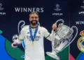 Dani Carvajal displays the Uefa Champions League trophy together with his man of the match award in 2024 UCL final