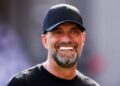 Jurgen Klopp smiles at the camera