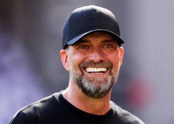 Jurgen Klopp smiles at the camera