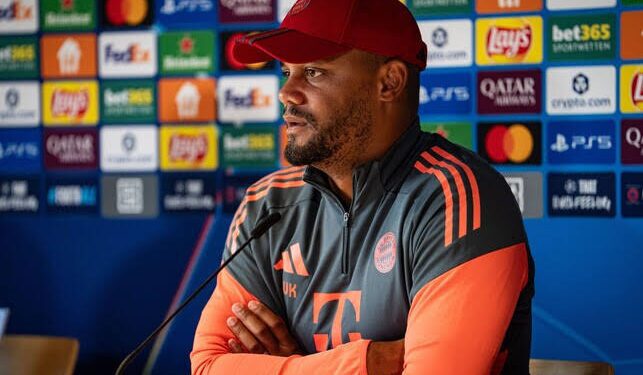 Vincent Kompany seated for his pre-match presser