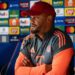 Vincent Kompany Responds to Arteta Ahead PSG Clash 15 Vincent Kompany seated for his pre-match presser