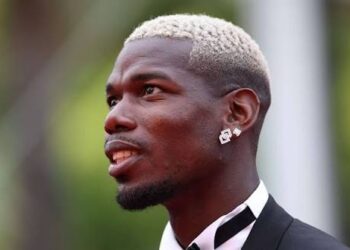 Paul Pogba with a blonde hair