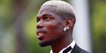 Paul Pogba with a blonde hair