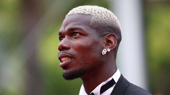 Pogba Opens Up on Relationship With Mourinho 1 Paul Pogba with a blonde hair