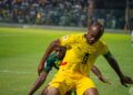 Jordan Ayew protects the ball from the Comoros defender in the World Cup qualifier at the Accra Sports Stadium