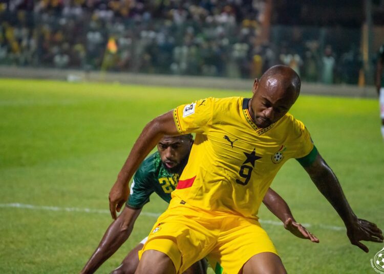 Jordan Ayew protects the ball from the Comoros defender in the World Cup qualifier at the Accra Sports Stadium