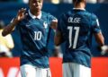 Kylian Mbappé and Michael Olise in action for France