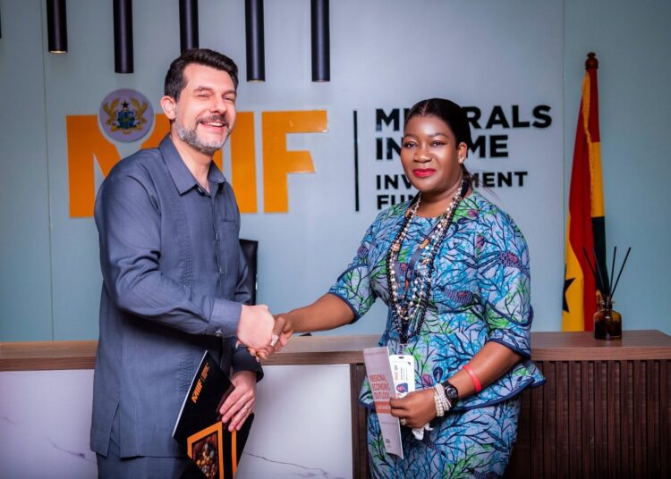MIIF CEO, Mrs. Justina Nelson with IMF Resident Representative, Dr Adrian Alter