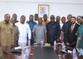 Hon. Sampson Ahi, Deputy Minister of Trade, Agribusiness, and Industry, with Hon. Alexander Roosevelt Hottordze, Chairman of the Parliamentary Select Committee on Trade, Industry, and Tourism, and Team