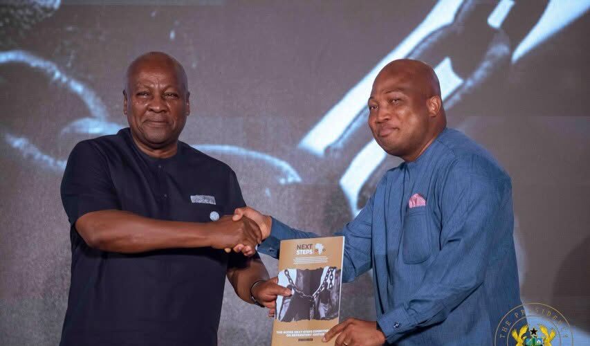 President John Dramani Mahama receiving the roadmap from the Next Step Conference from Minister for Foreign Affairs, Samuel Okudzeto Ablakwa