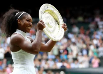 Tennis Star Serena Williams Set for Competitive Return After Four-Year Absence 3 Serena Williams displays her Wimbledon trophy