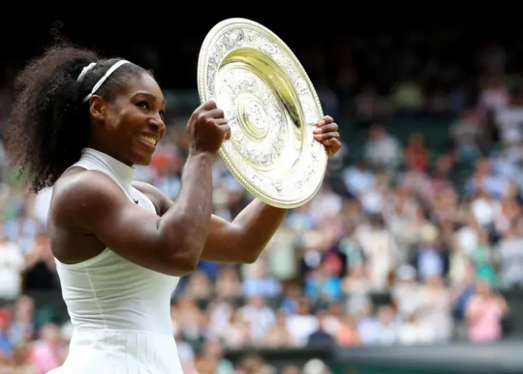 Serena Williams displays her Wimbledon trophy