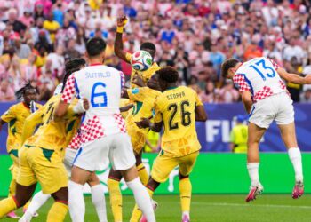 Nikola Vlasic jumps high to head home the corner