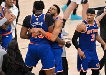 Knicks Win Historic NBA Title After 53-Year Wait 4 New York Knicks players burst into jubilation after securing the NBA title