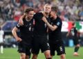 Norway Survive Late Senegal Fightback to Reach Knockout Round at the World Cup 2 Erling Haaland celebrates with his teammates after scoring against Senegal at the MetLife Stadium in New York New Jersey